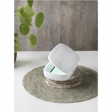 Logotrade advertising product picture of: Capsule UV smartphone sanitizer with 5W wireless charging pad