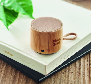 Logotrade promotional giveaway picture of: Round bamboo wireless speaker